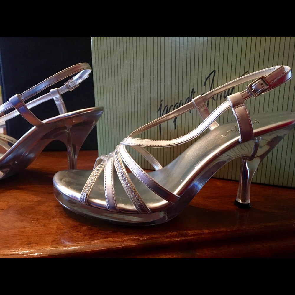 Silver and clear strappy heels with rhinestones.